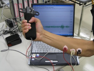 Electromyogram measurement during grip strength exertion