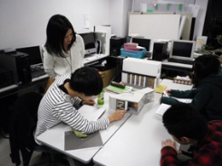 Seminar students examining an interior model